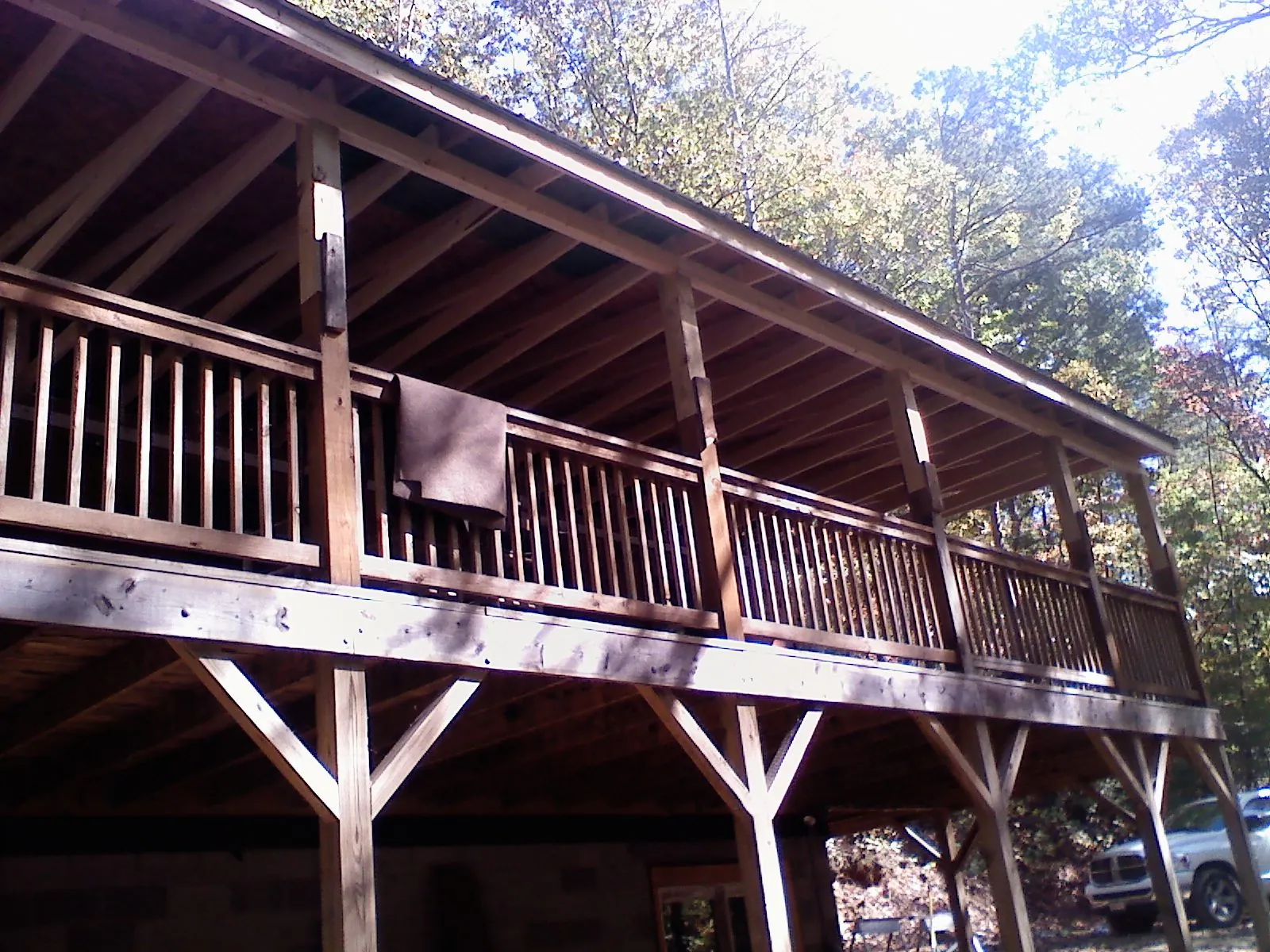 Timber framing under a new elevated porch and deck — Roof Leak Repair in Palisades by Roofing Brothers